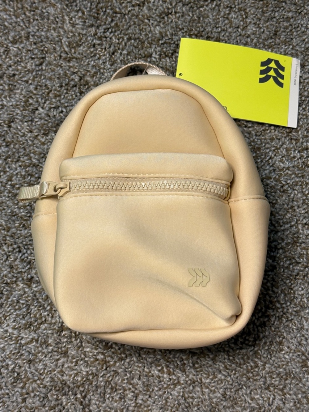 all in motion Cream Mini Backpack
